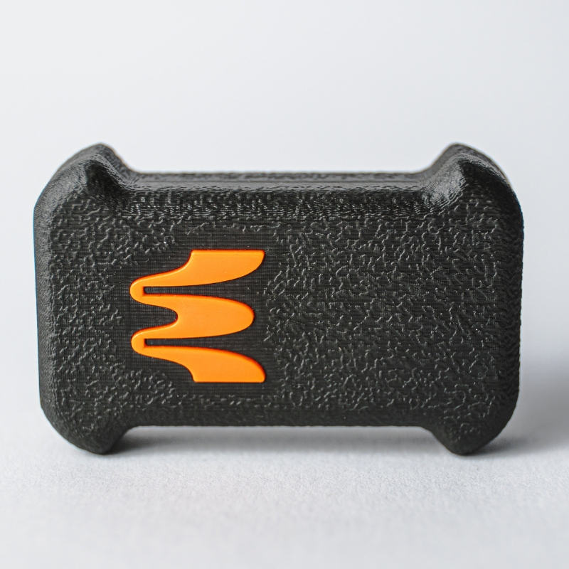 The Enode Sensor, used in velocity-based training for powerlifting.